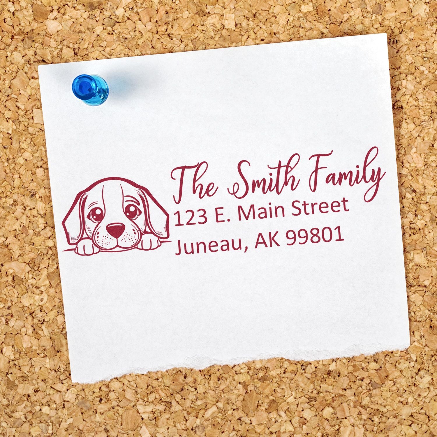 Custom rubber address stamp with dog illustration for The Smith Family, showing a return address in Juneau, Alaska.
