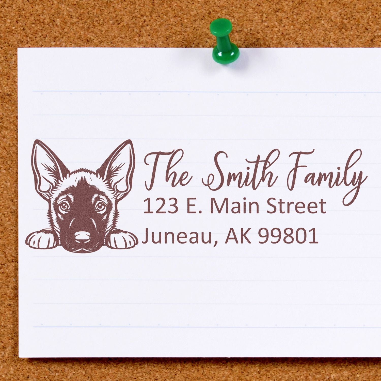 Personalized return address rubber stamp with dog illustration for The Smith Family in Juneau, AK.