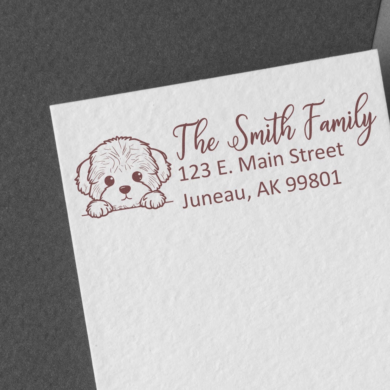 Personalized dog return address rubber stamp for The Smith Family, with Juneau, AK mailing address.