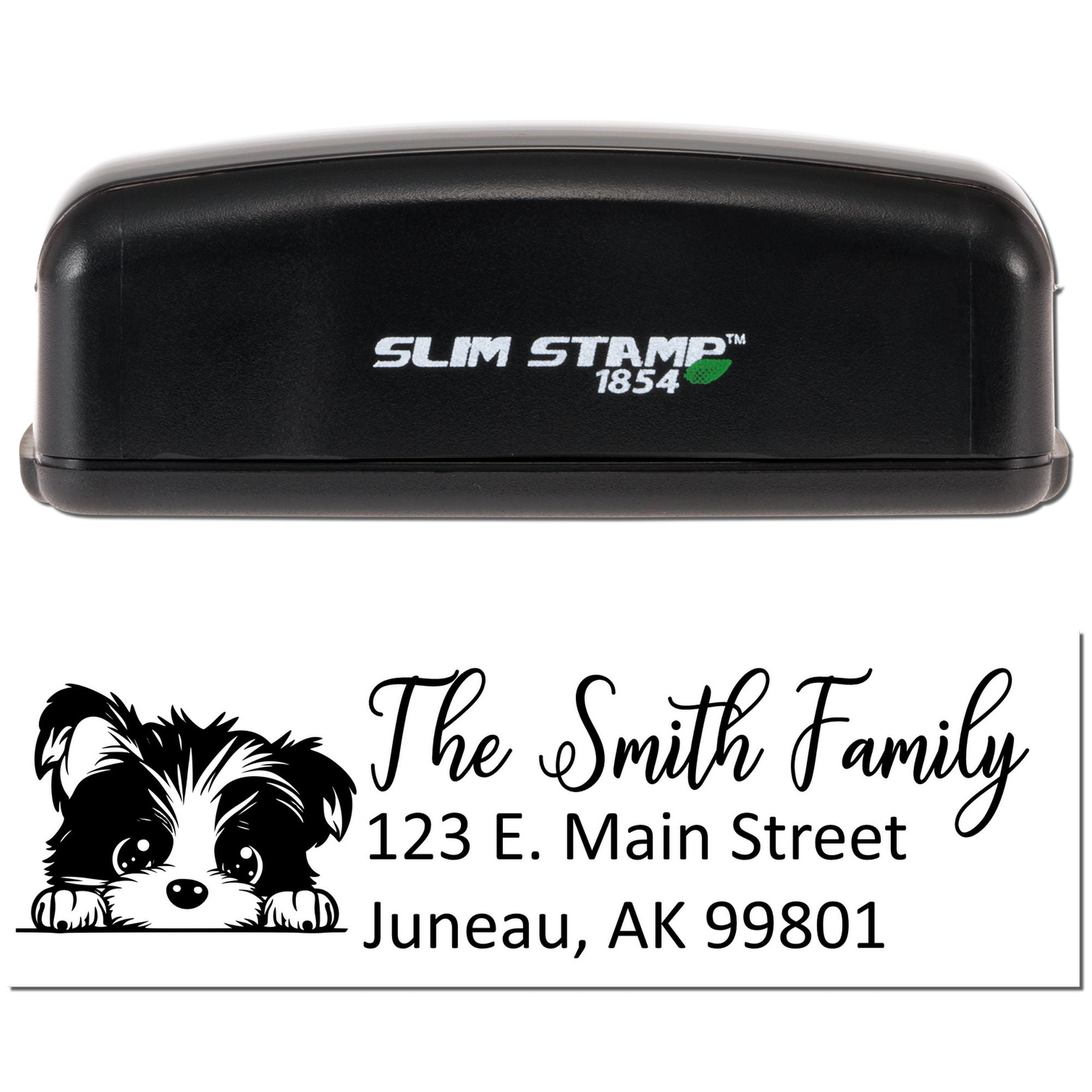 Personalized self-inking return address stamp with dog illustration for The Smith Family, Juneau, AK 99801.