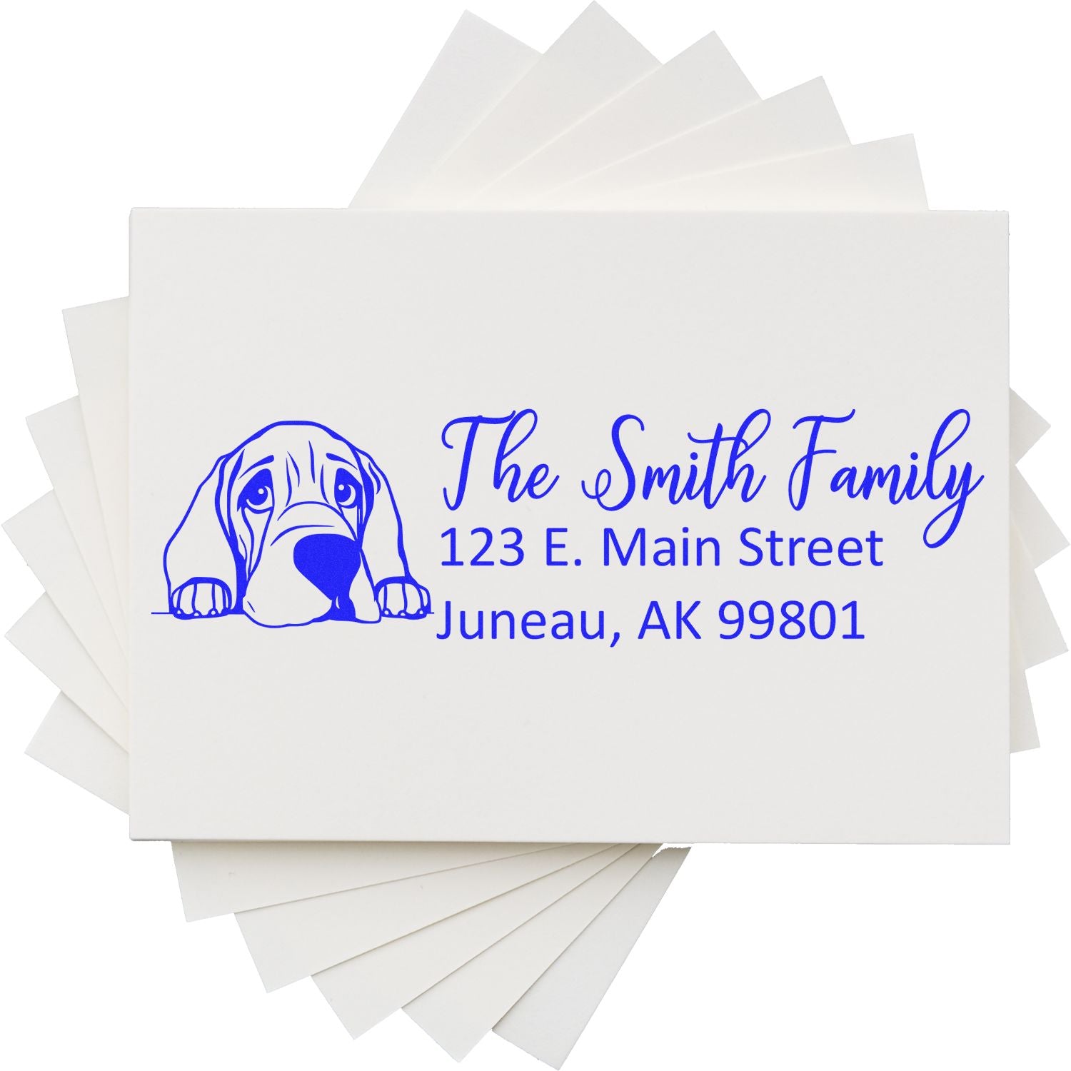 Personalized return address rubber stamp with dog illustration for The Smith Family, Juneau, AK 99801.