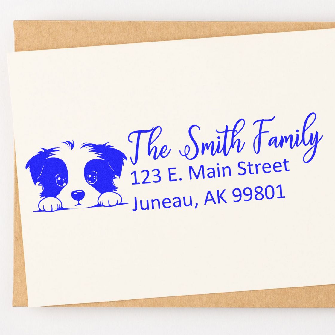 Personalized return address rubber stamp with dog design for The Smith Family, Juneau, AK.