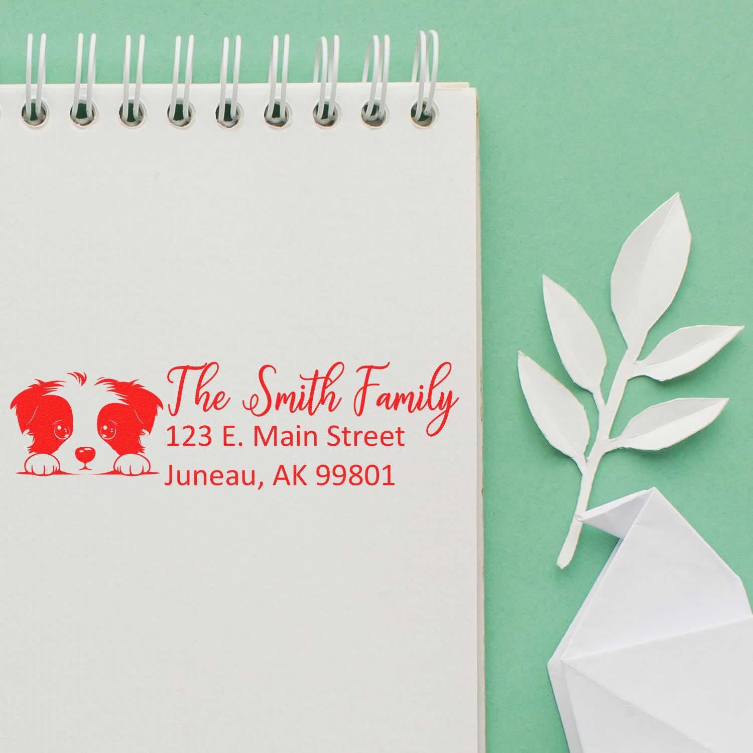Personalized return address rubber stamp with dog logo for The Smith Family, Juneau, AK 99801