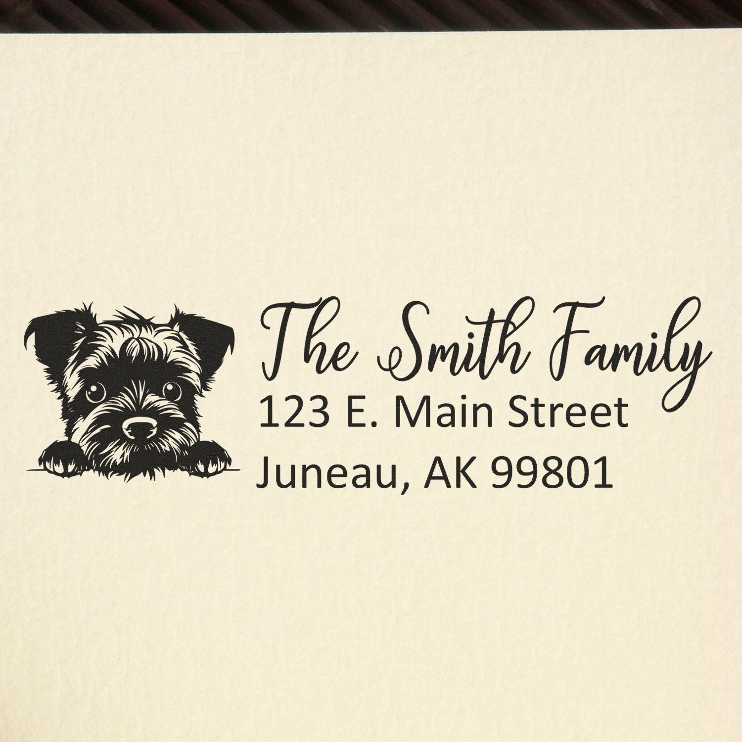 Custom dog return address rubber stamp for The Smith Family, Juneau, AK, with personalized home address.