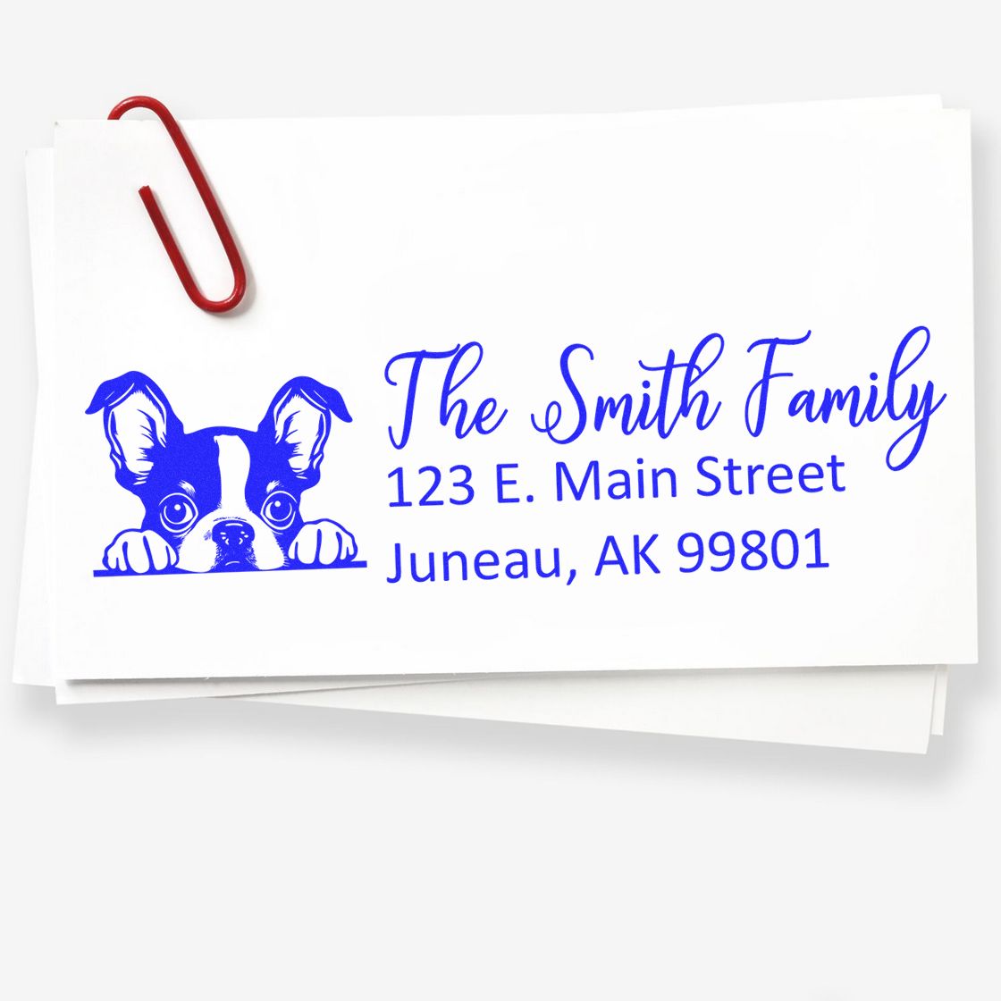 Custom return address rubber stamp with dog graphic for The Smith Family, featuring Juneau, AK mailing address.