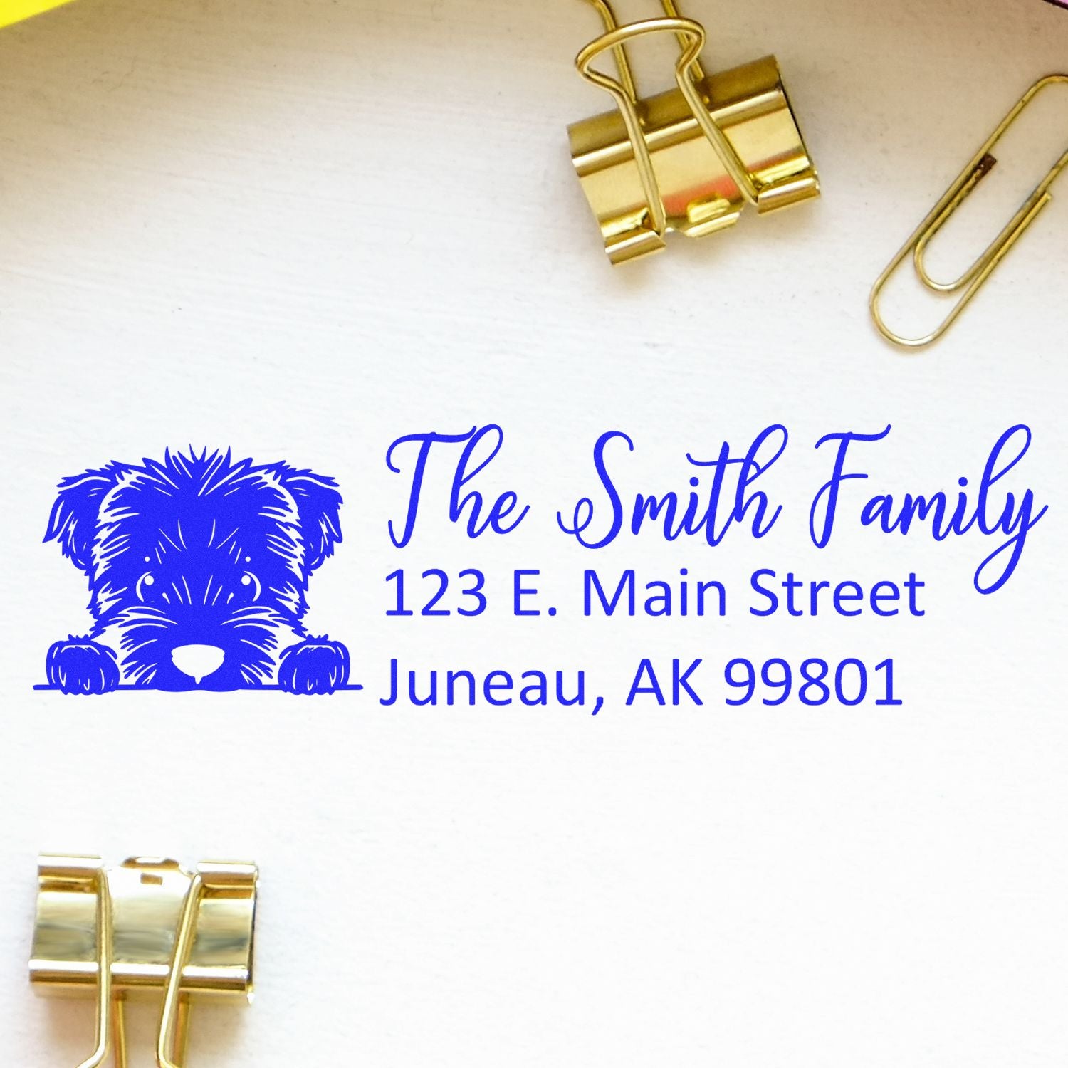 Custom rubber address stamp with dog logo for The Smith Family, featuring name and Juneau, AK address.
