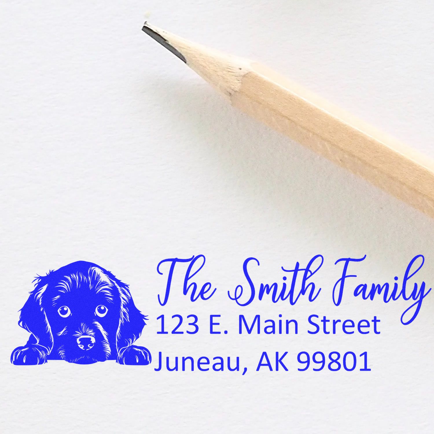 Personalized dog-themed address rubber stamp for The Smith Family, 123 E. Main Street, Juneau, AK 99801
