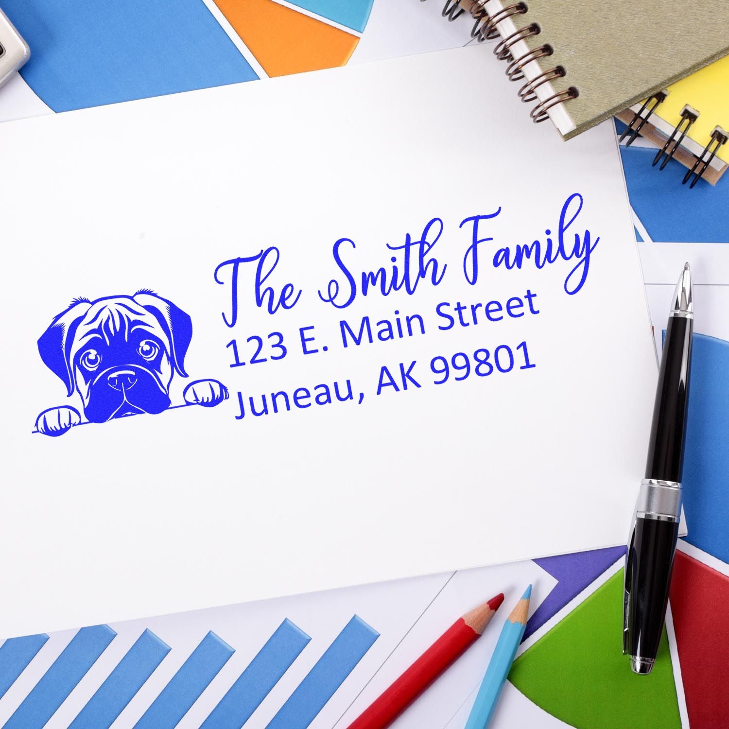 Custom rubber stamp with dog graphic and personalized return address, featuring The Smith Family in Juneau, AK.