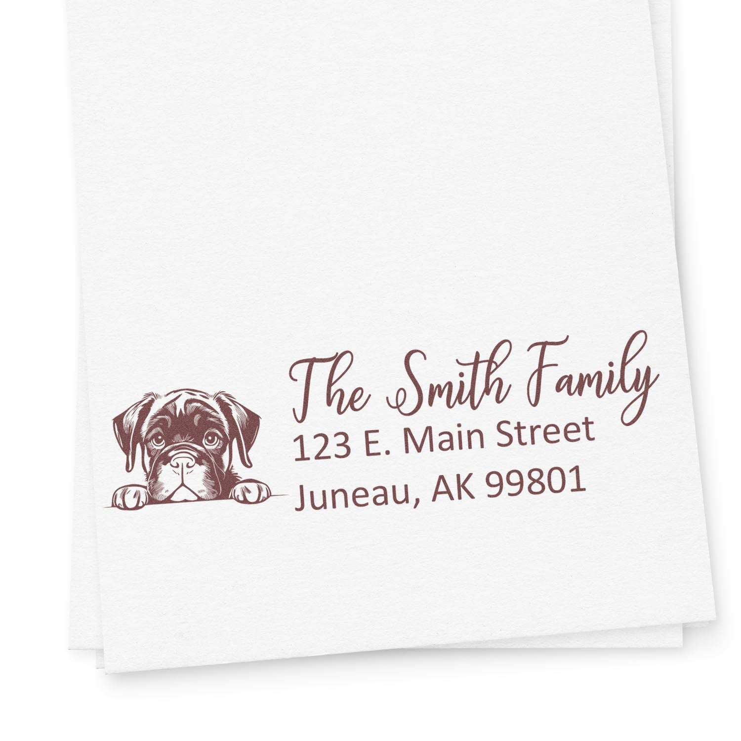 Personalized address rubber stamp with dog illustration for The Smith Family, Juneau, AK return address.