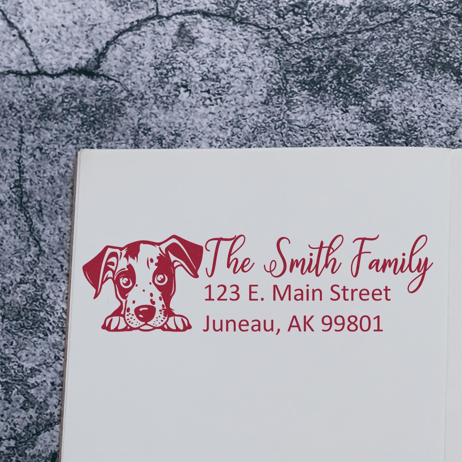 Custom return address rubber stamp with dog icon for The Smith Family, Juneau, AK 99801