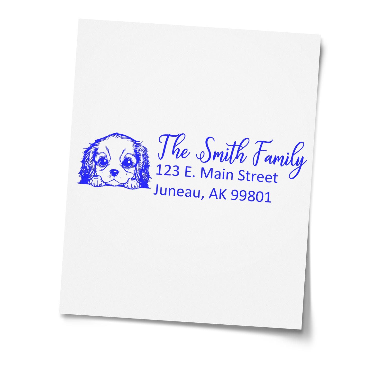 Personalized return address rubber stamp with dog illustration for The Smith Family, Juneau, AK.