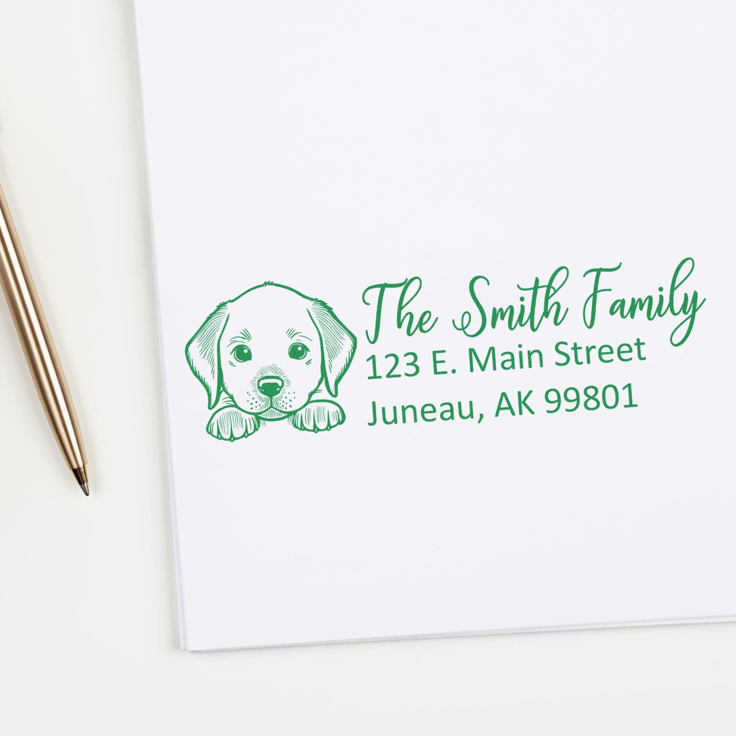 Personalized rubber stamp with puppy illustration and return address for The Smith Family, Juneau, AK 99801