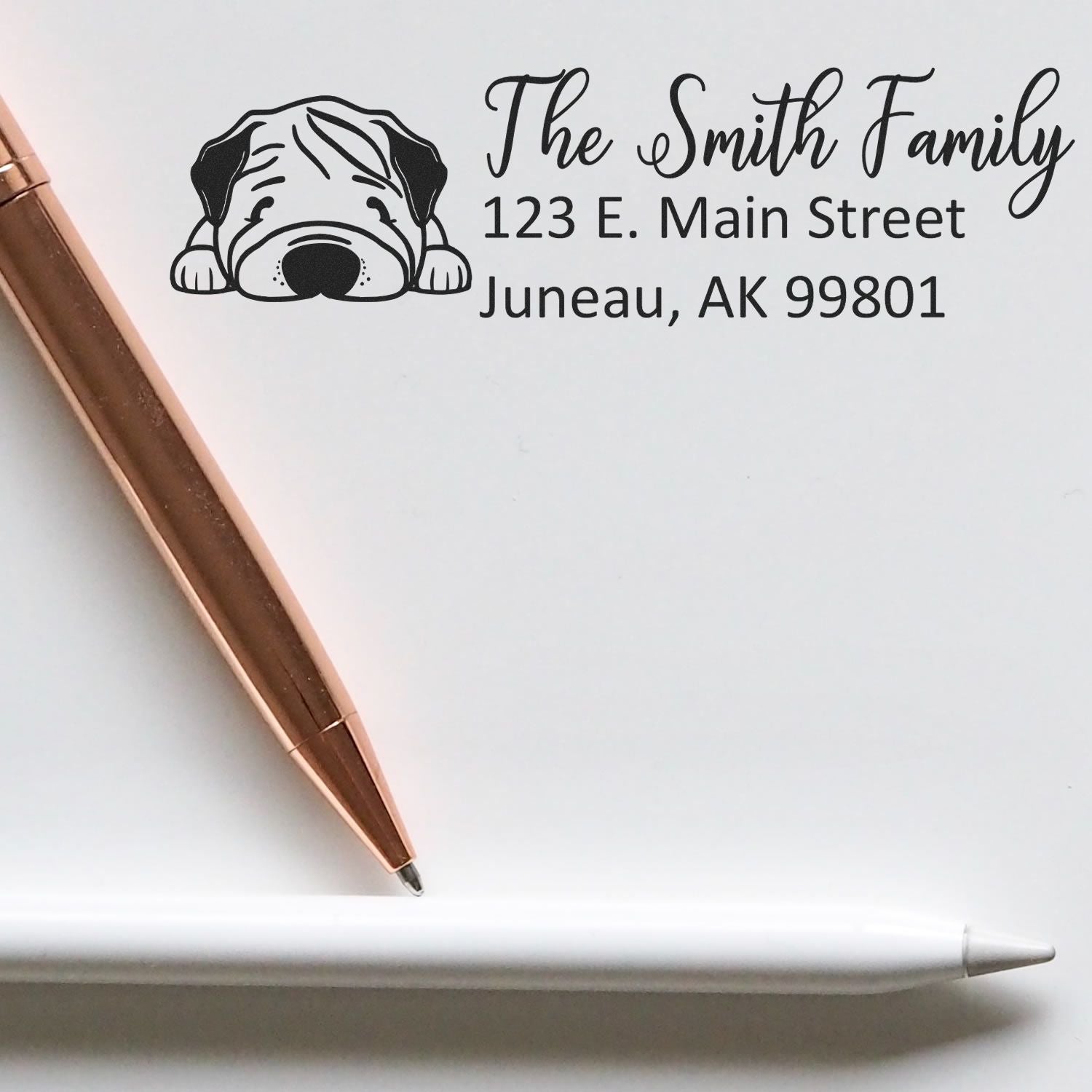 Custom address rubber stamp for The Smith Family with bulldog design, 123 E. Main Street, Juneau, AK 99801