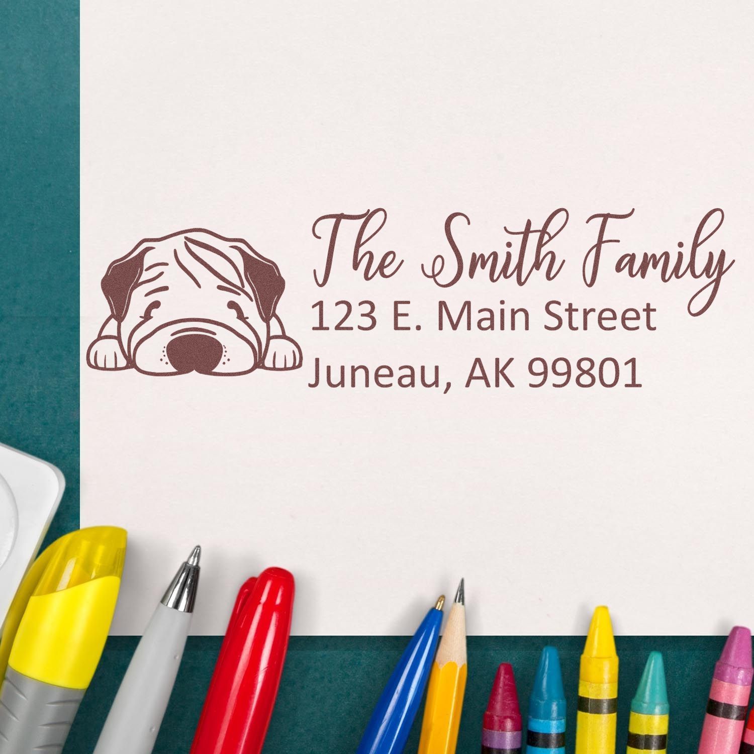Custom family address rubber stamp with bulldog design for envelopes, featuring The Smith Family, Juneau AK 99801.