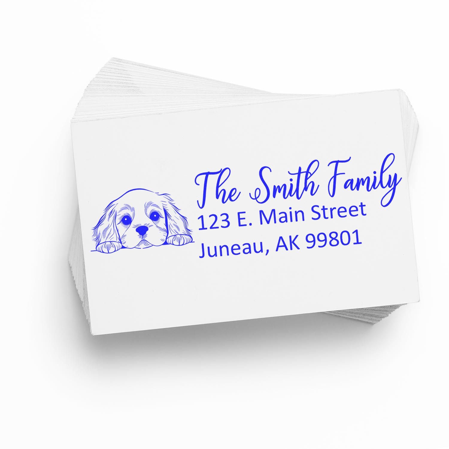 Custom rubber stamp address design with dog illustration for The Smith Family, 123 E. Main Street, Juneau, AK 99801