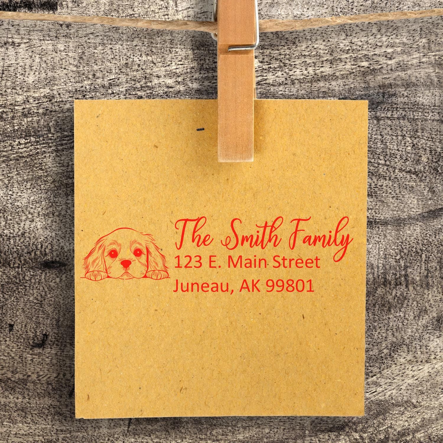 Custom rubber stamp with dog illustration for The Smith Family return address on envelopes and mail.