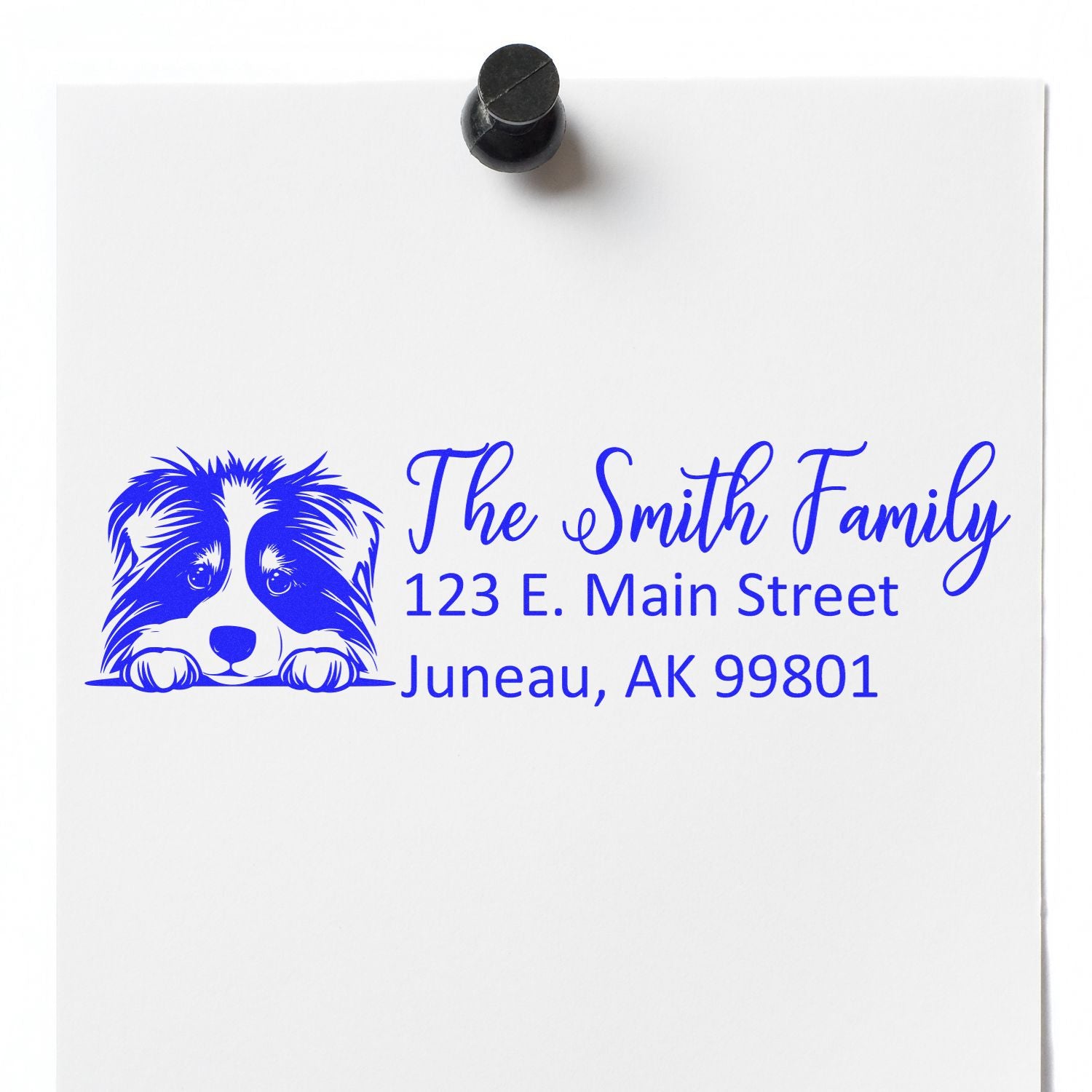 Custom rubber address stamp with dog graphic, The Smith Family name, and Juneau, AK 99801 return address.