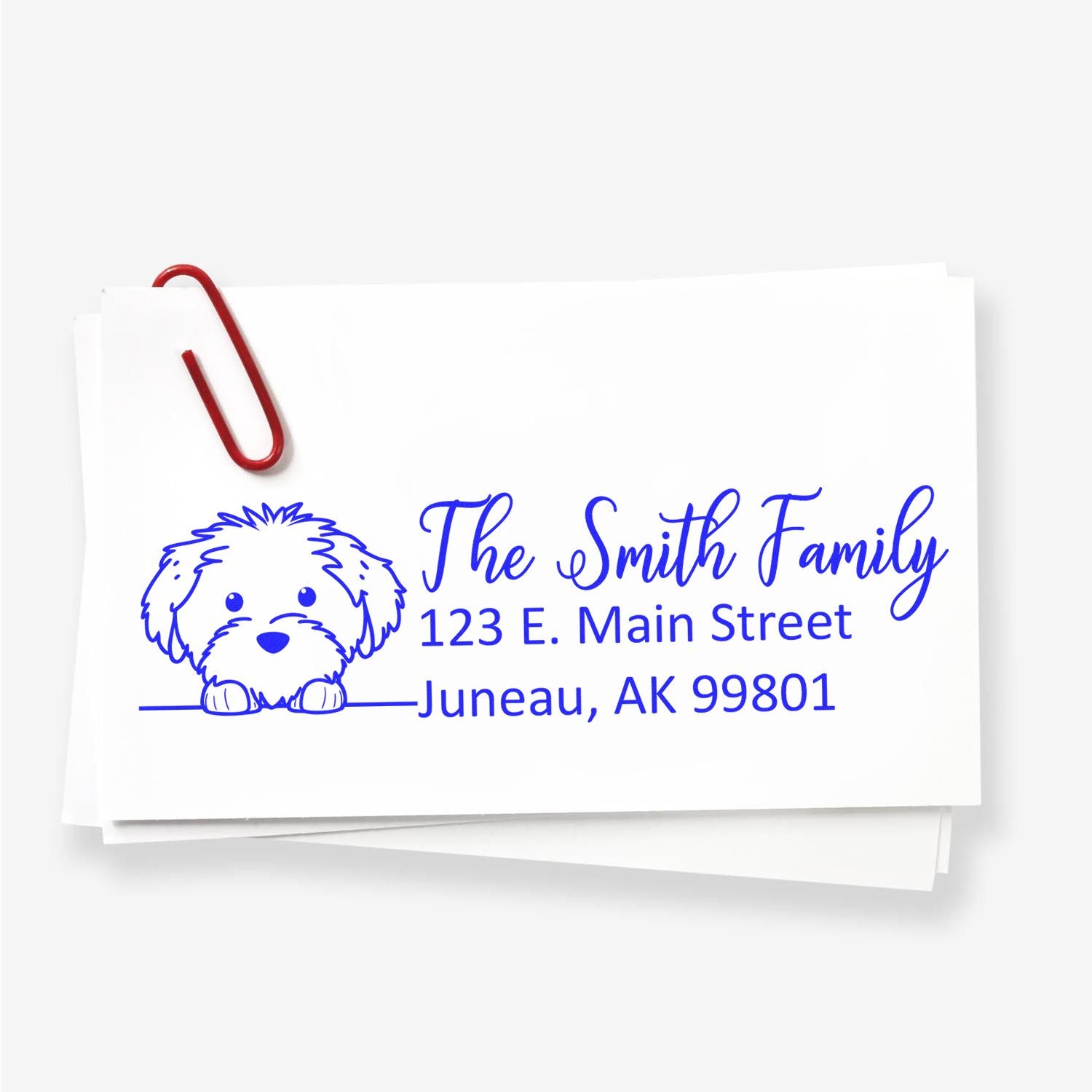 Custom dog address rubber stamp with The Smith Family name and Juneau, AK return address for envelopes and mailings.
