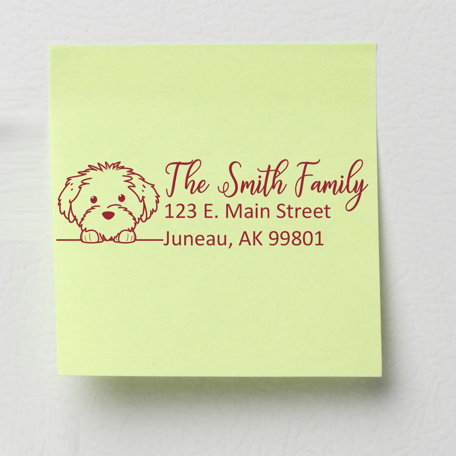Personalized family return address rubber stamp with dog illustration, showing The Smith Family address in Juneau, AK.
