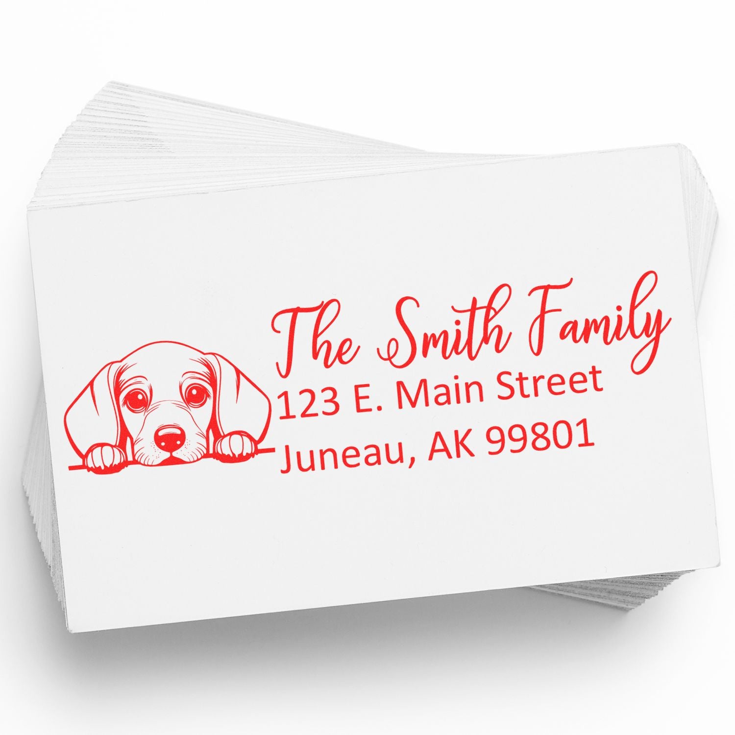 Personalized return address rubber stamp with dog illustration for The Smith Family, 123 E. Main Street, Juneau AK 99801.