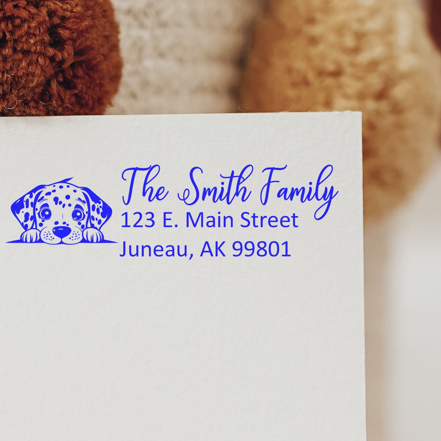 Custom return address rubber stamp with puppy icon for The Smith Family, featuring Juneau, AK address.