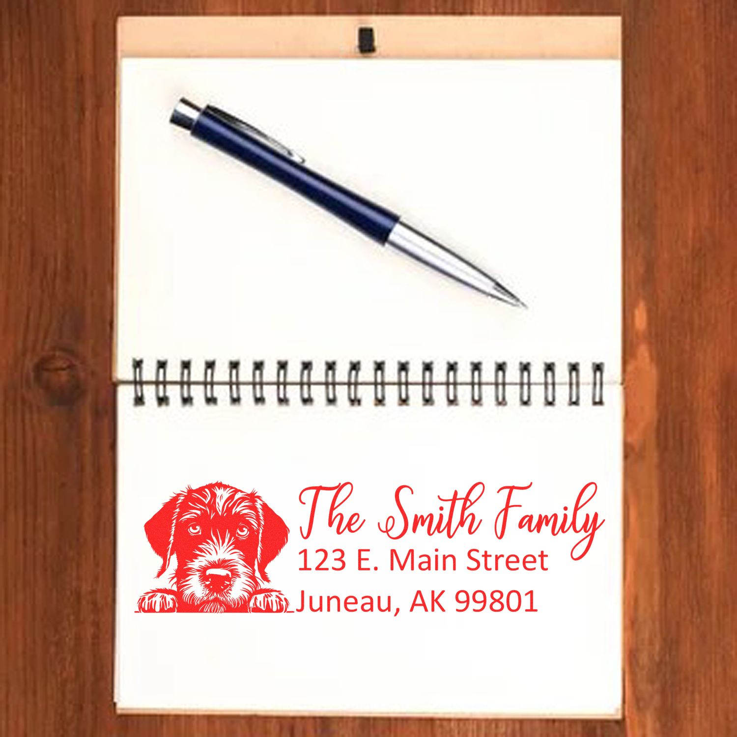 Personalized dog address rubber stamp for The Smith Family with name, street address, and Juneau, AK return address.