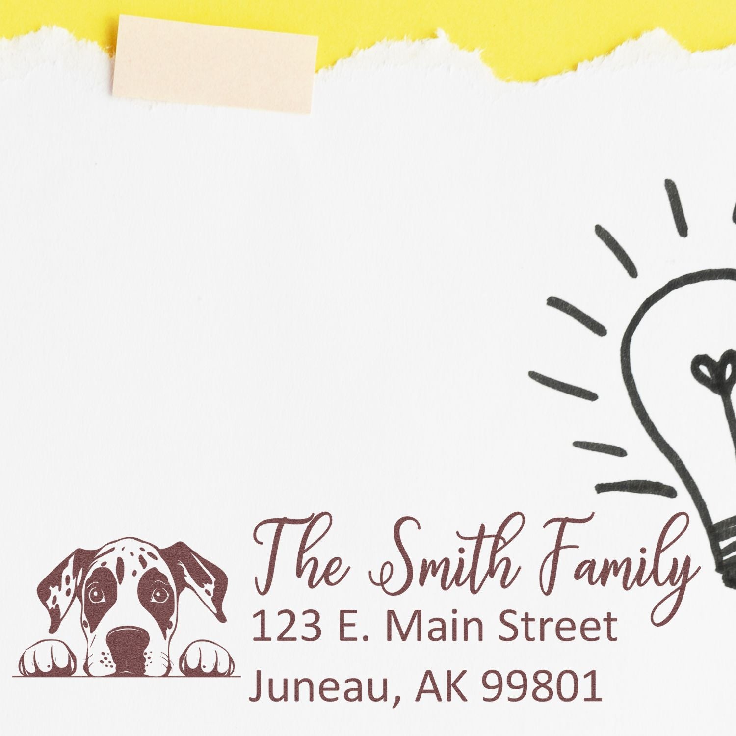 Personalized rubber address stamp with dog illustration, The Smith Family, and Juneau, AK return address.
