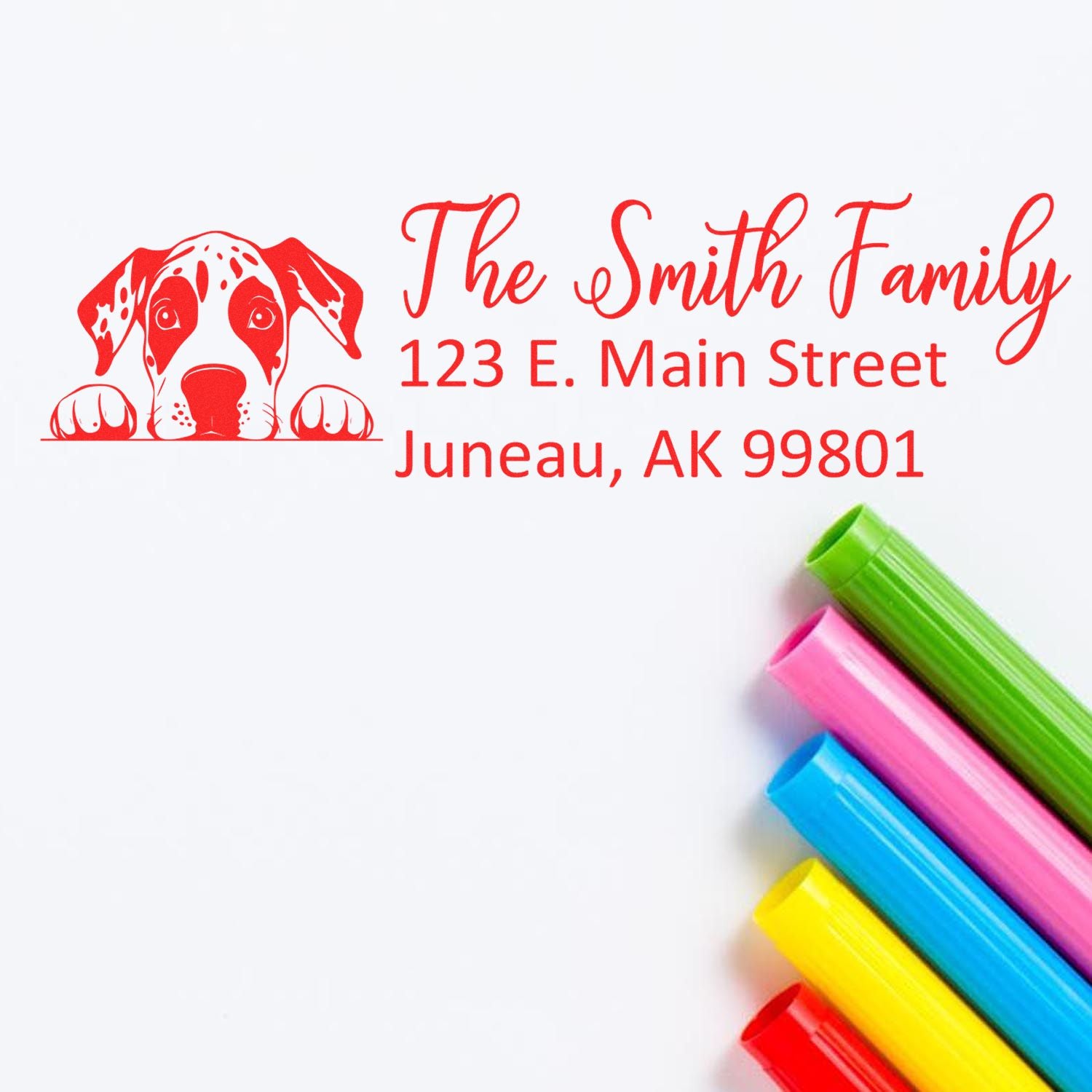 Custom dog return address rubber stamp for The Smith Family, Juneau, AK, with name and street address.
