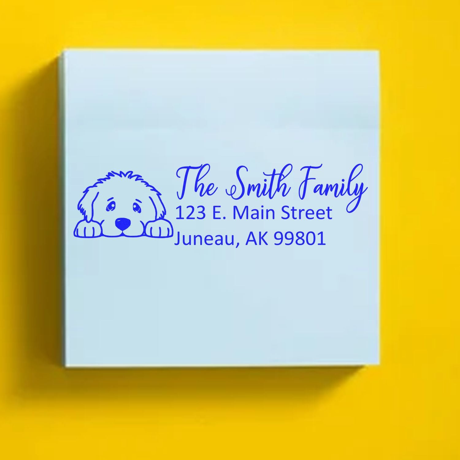 Custom return address rubber stamp with dog illustration for The Smith Family, Juneau, AK.