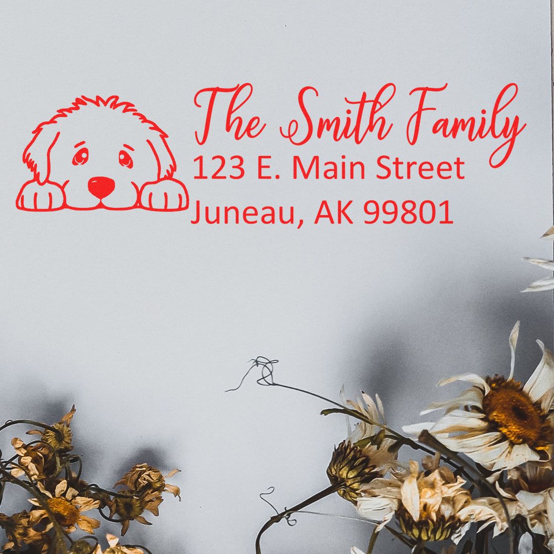 Personalized return address rubber stamp with dog icon, The Smith Family, 123 E. Main Street, Juneau, AK 99801.