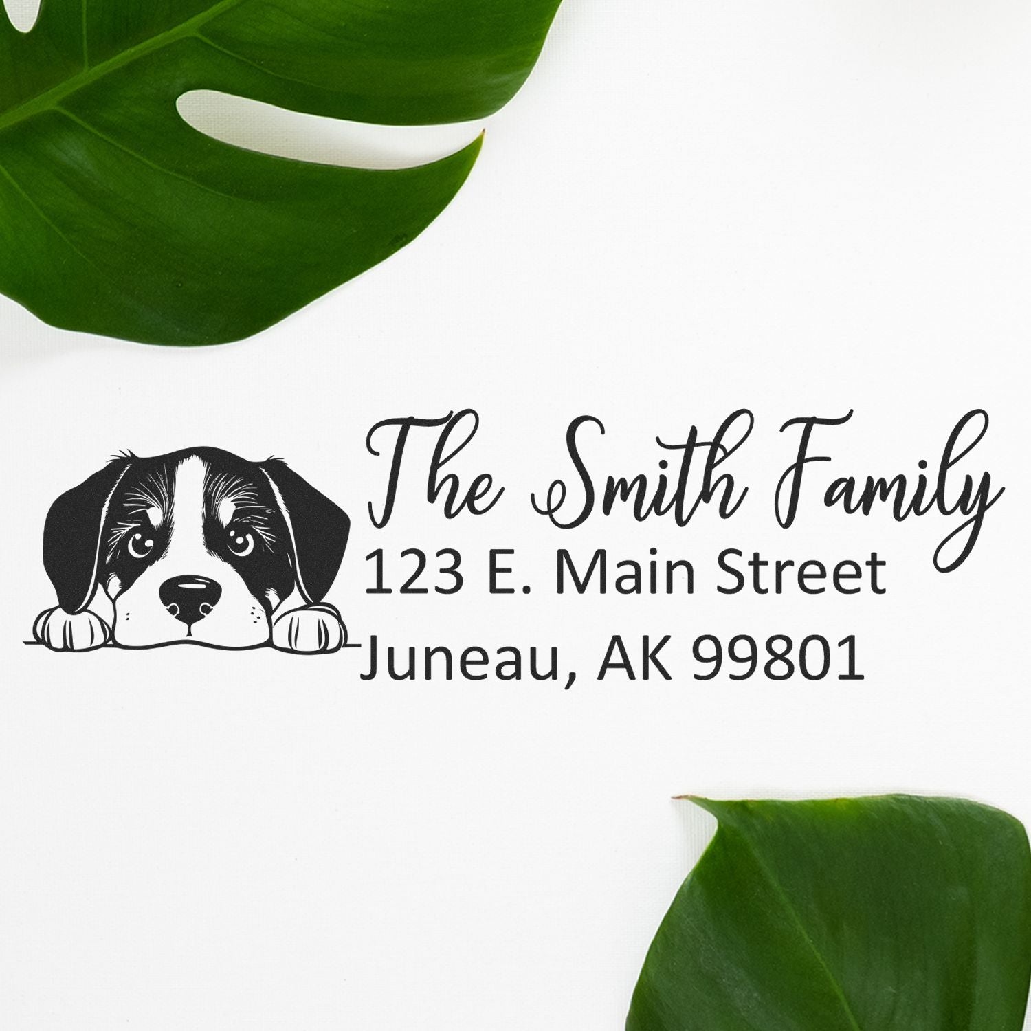 Personalized return address rubber stamp with dog design for The Smith Family, Juneau, AK 99801.