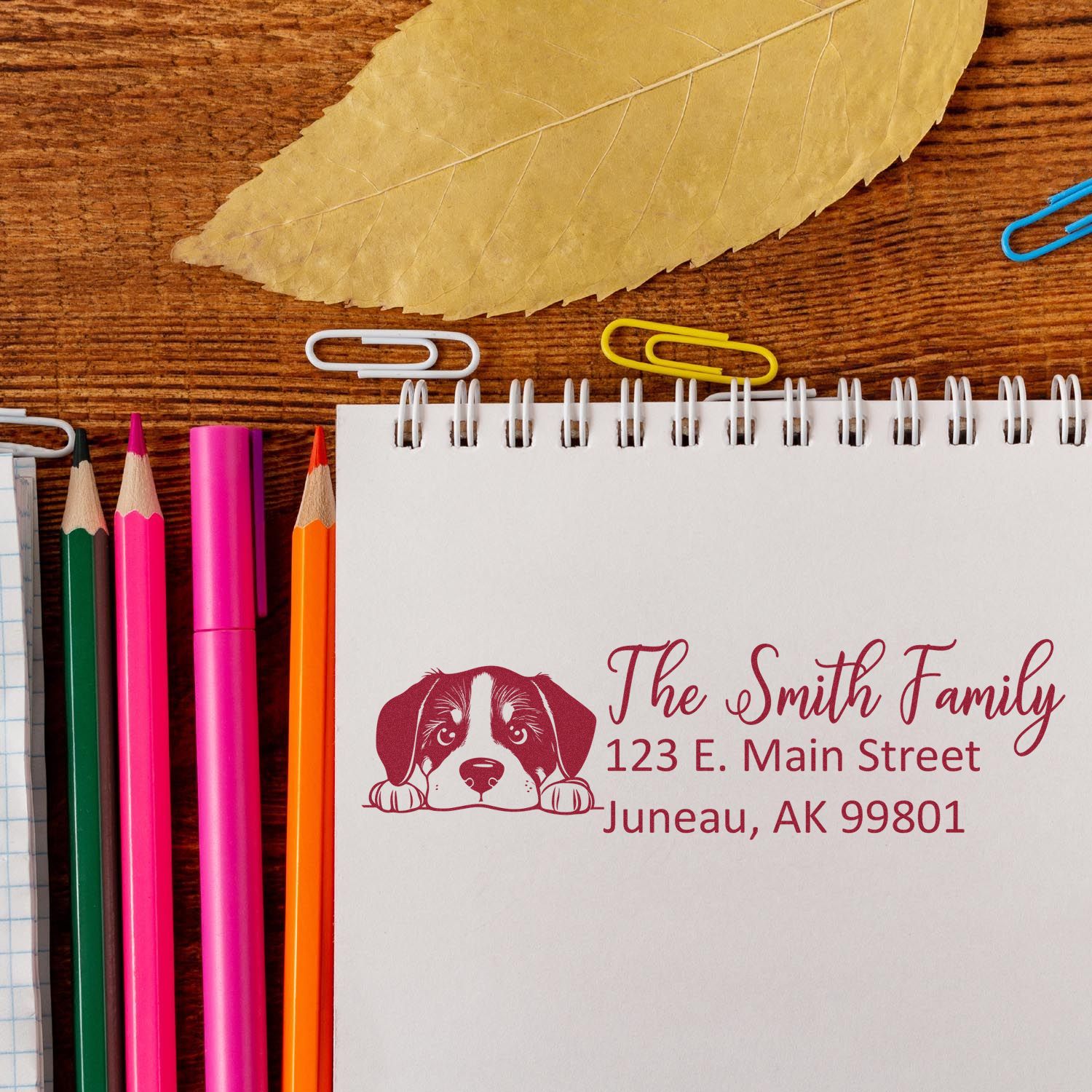 Custom rubber address stamp with dog illustration, featuring The Smith Family personalized return address design.
