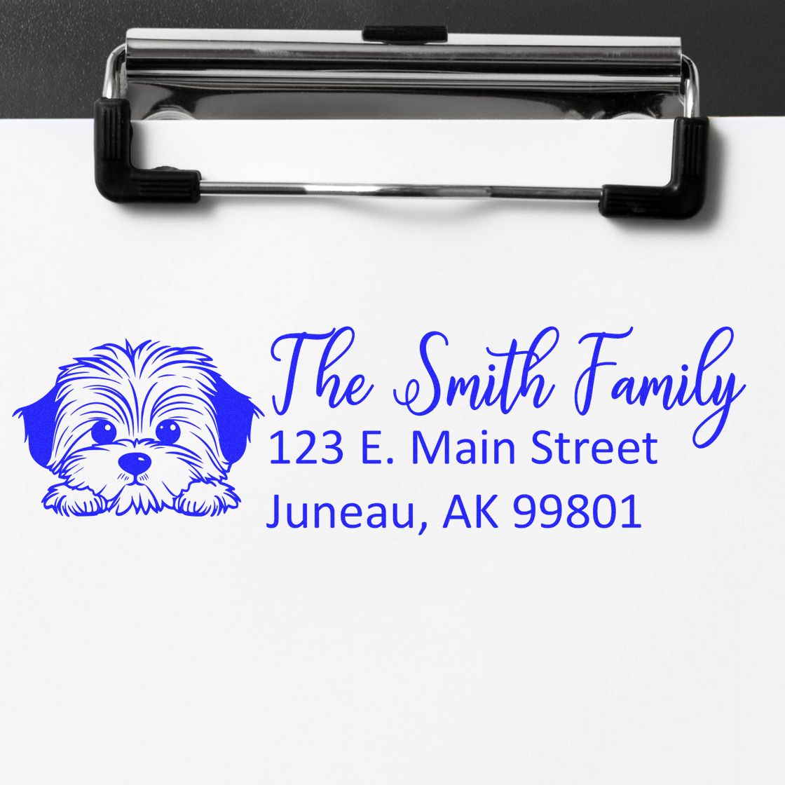 Personalized return address rubber stamp with dog logo for The Smith Family, 123 E. Main Street, Juneau, AK 99801