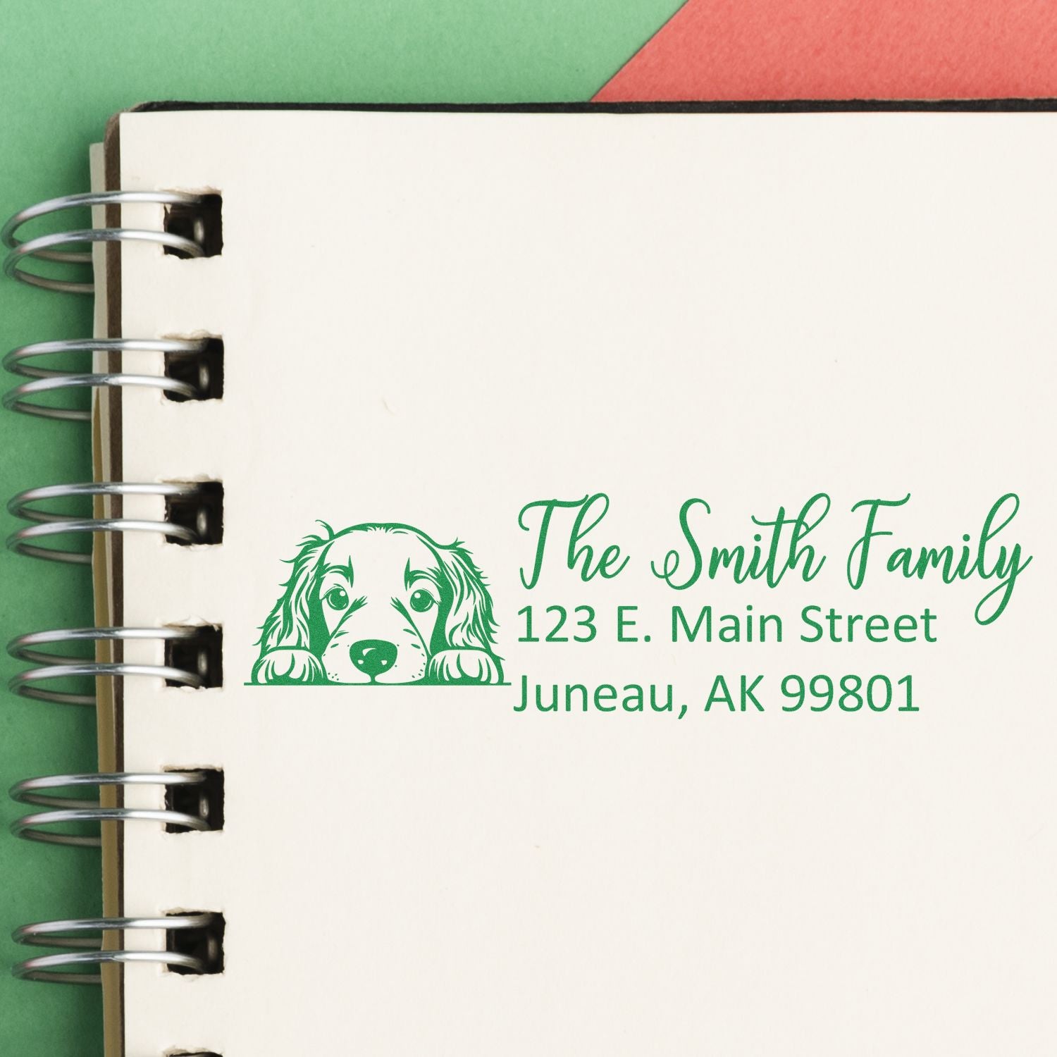 Personalized dog address rubber stamp for The Smith Family, 123 E. Main Street, Juneau, AK 99801 on stationery.