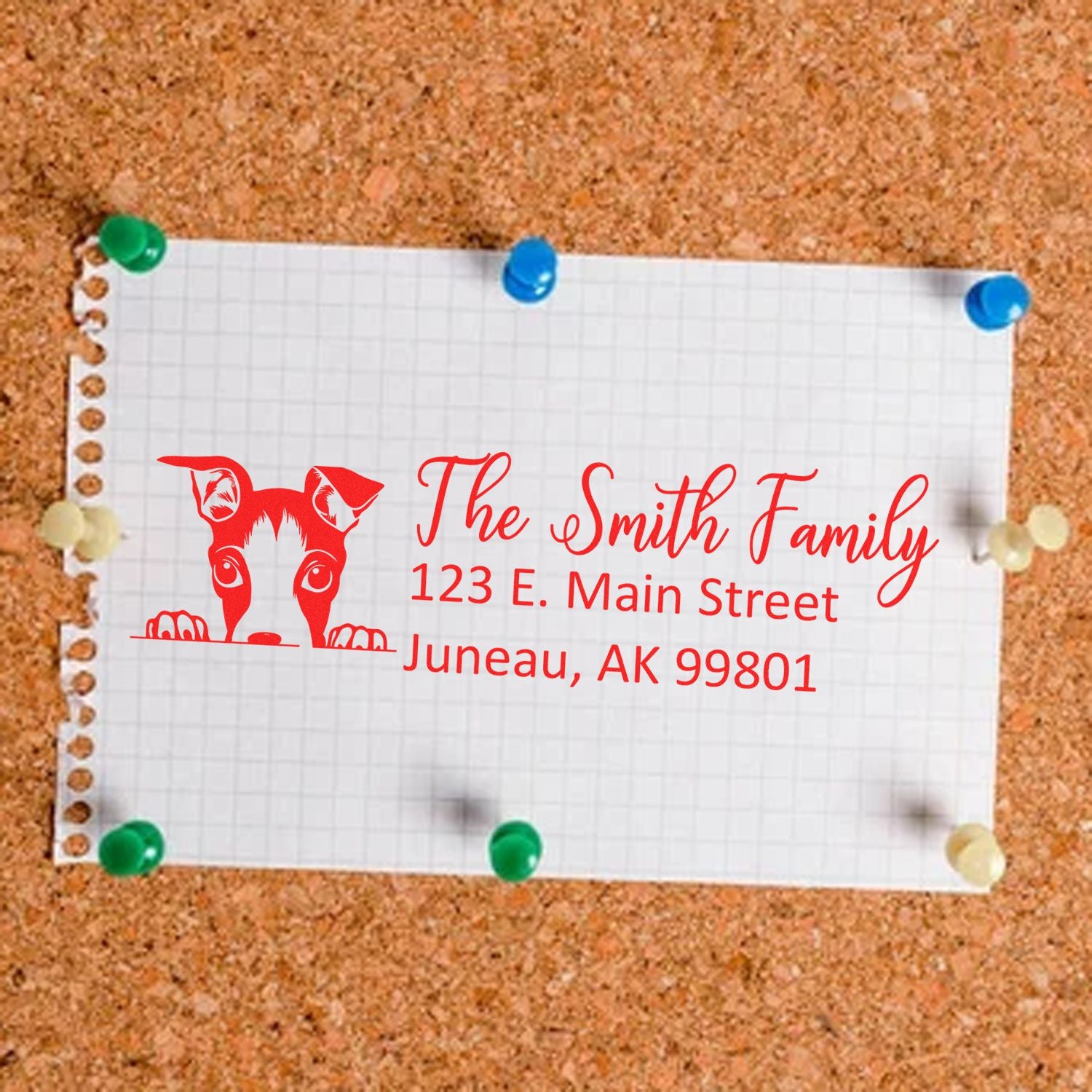 Personalized rubber return address stamp with dog illustration, The Smith Family name, and Juneau, AK address.