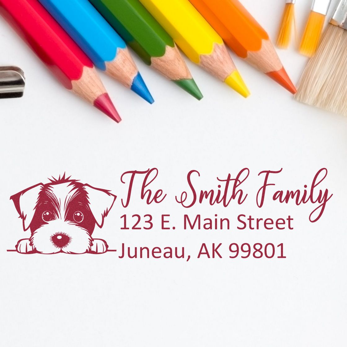 Custom address rubber stamp with dog illustration, ideal for personalized family return mail and pet lover stationery.