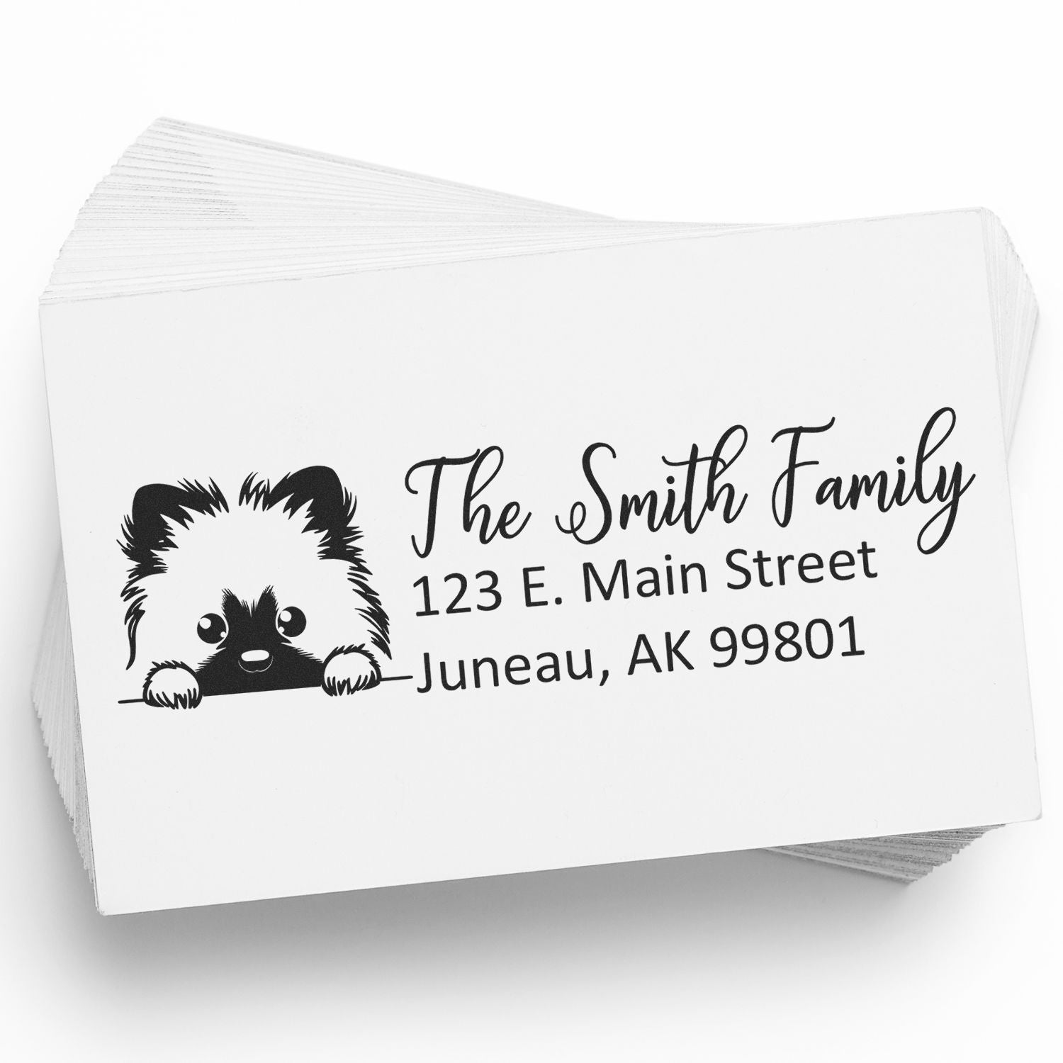 Custom address rubber stamp with dog design, featuring family name and return address for mailing envelopes.