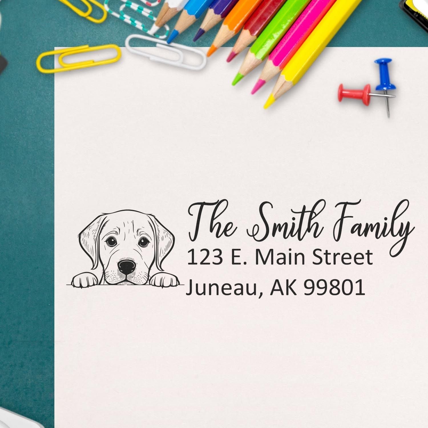 Custom dog return address rubber stamp with The Smith Family name and Juneau, AK address for personalized mailings.