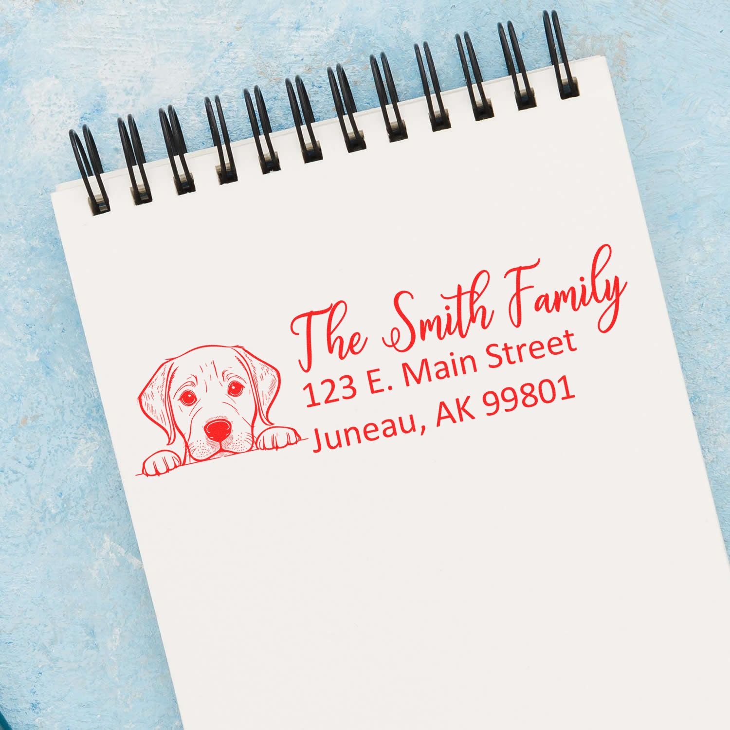 Personalized address rubber stamp with dog illustration for The Smith Family mailing labels and stationery.