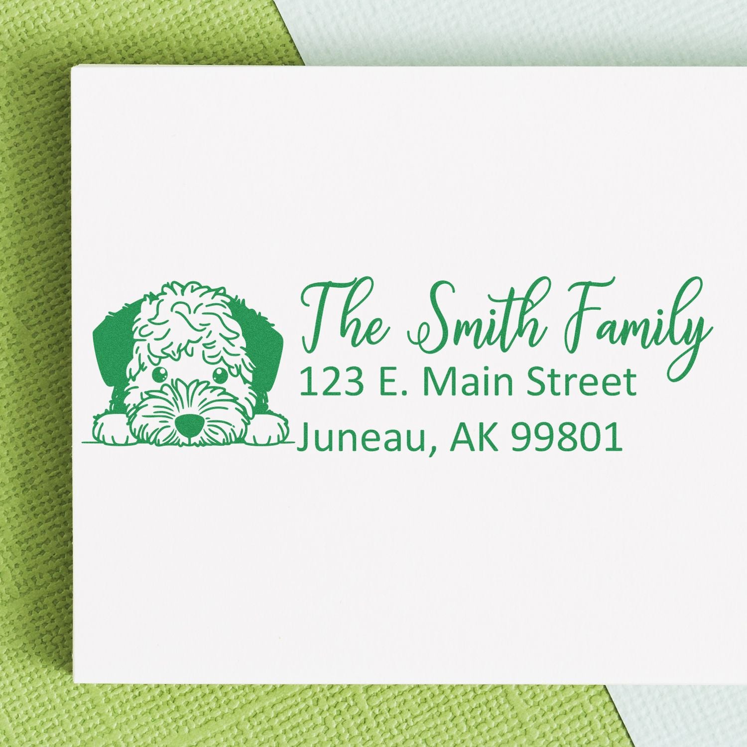 Custom dog return address rubber stamp for The Smith Family, 123 E. Main Street, Juneau, AK 99801.