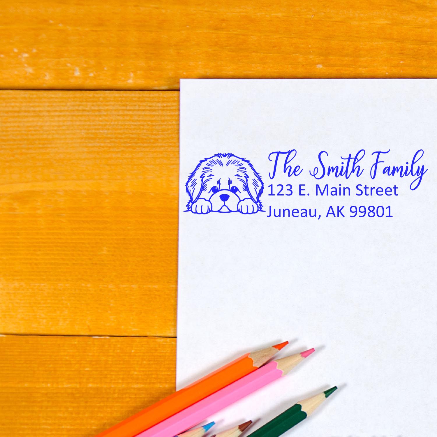 Personalized return address rubber stamp with dog design for The Smith Family, Juneau, AK 99801
