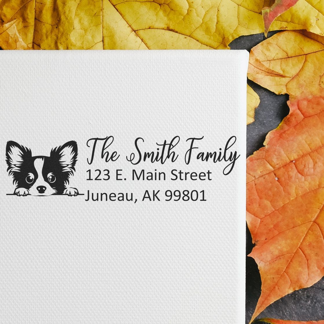 Custom rubber address stamp with corgi graphic, The Smith Family, and Juneau, AK return mailing address.