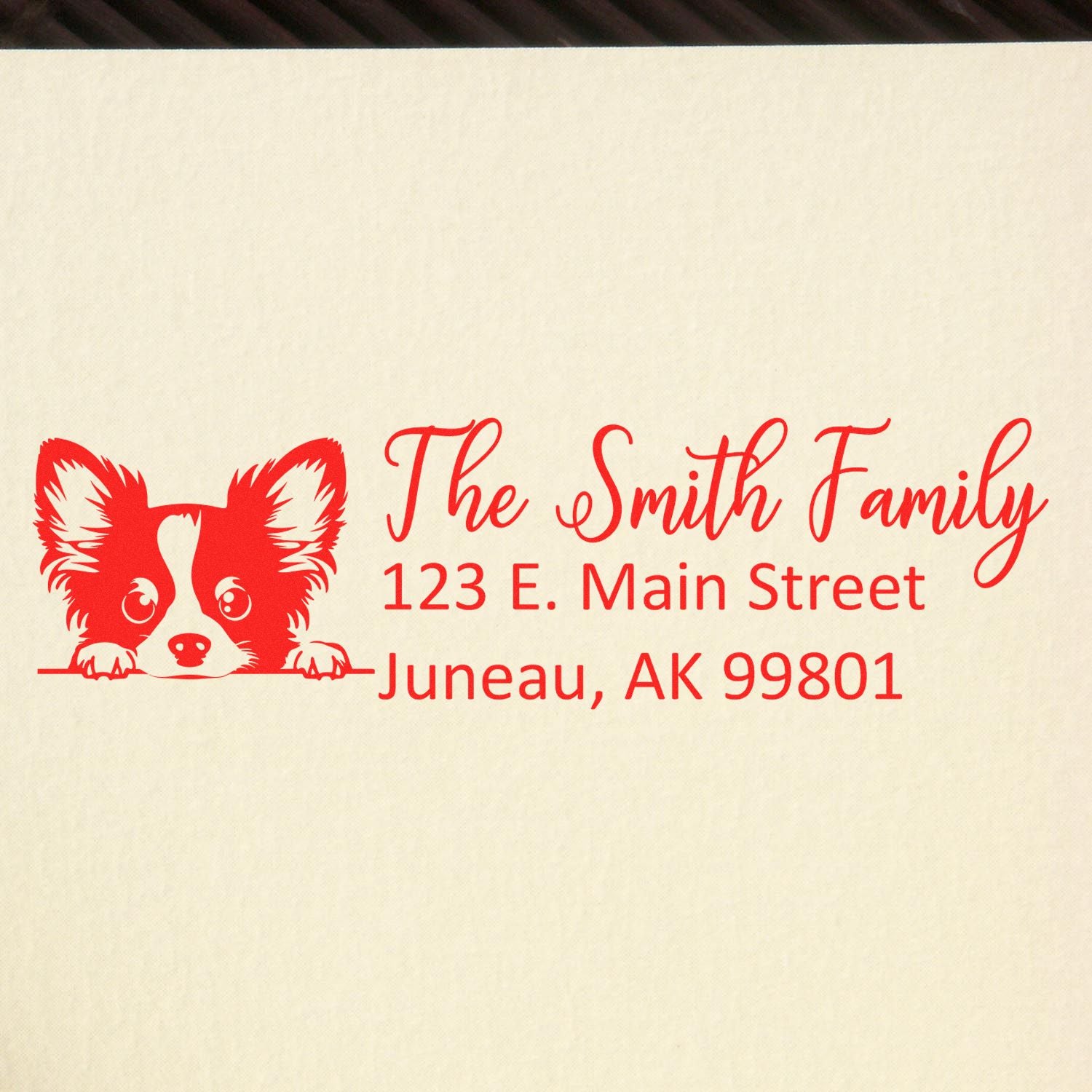 Personalized rubber stamp with corgi dog and The Smith Family return address in Juneau, AK.
