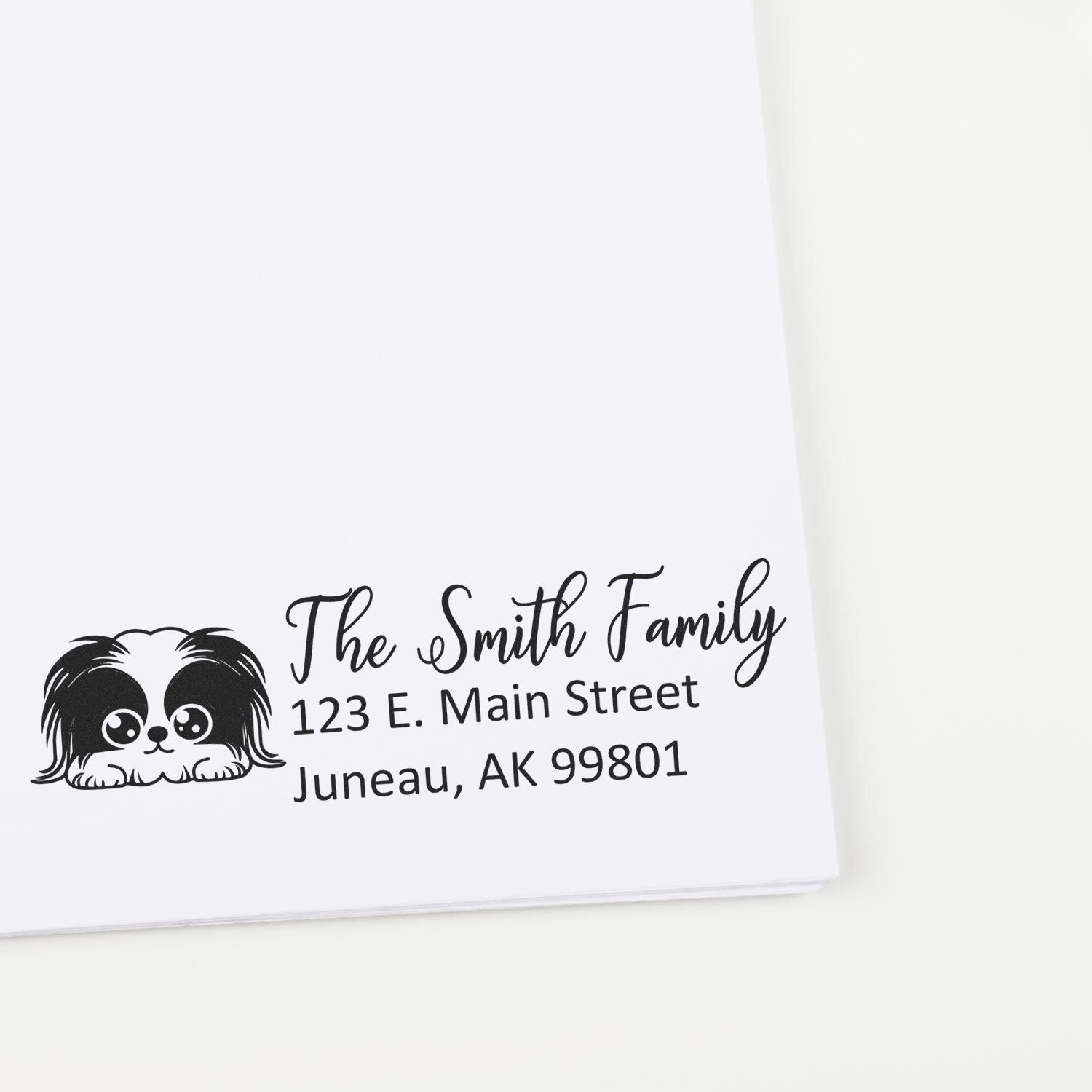 Custom family address rubber stamp with cute dog design, The Smith Family, 123 E. Main Street, Juneau, AK 99801