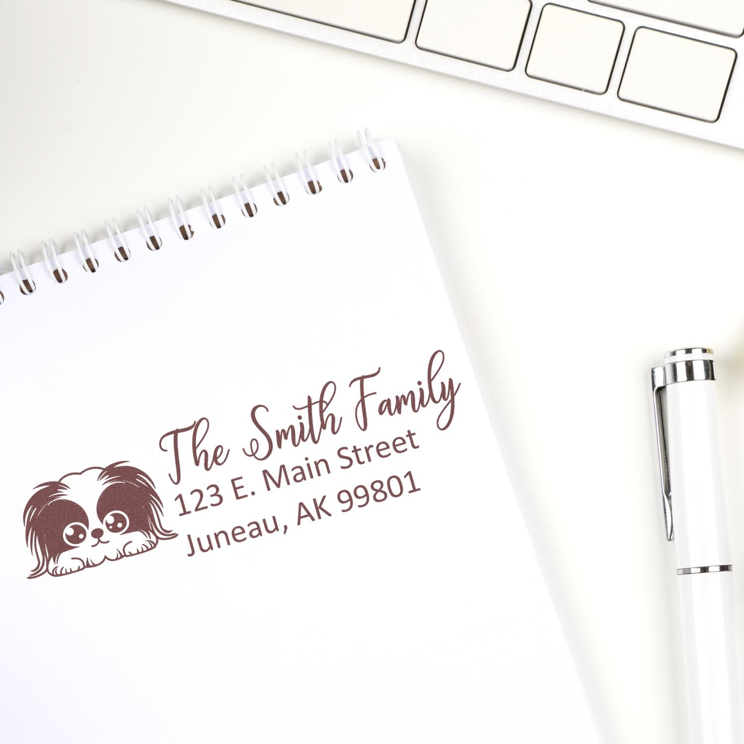 Custom family address rubber stamp with dog logo, perfect for personalized stationery and mailing.