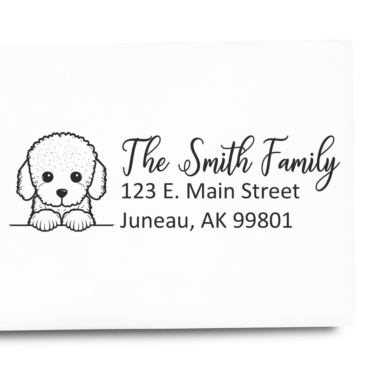 Custom dog address rubber stamp for The Smith Family, 123 E. Main Street, Juneau, AK 99801.