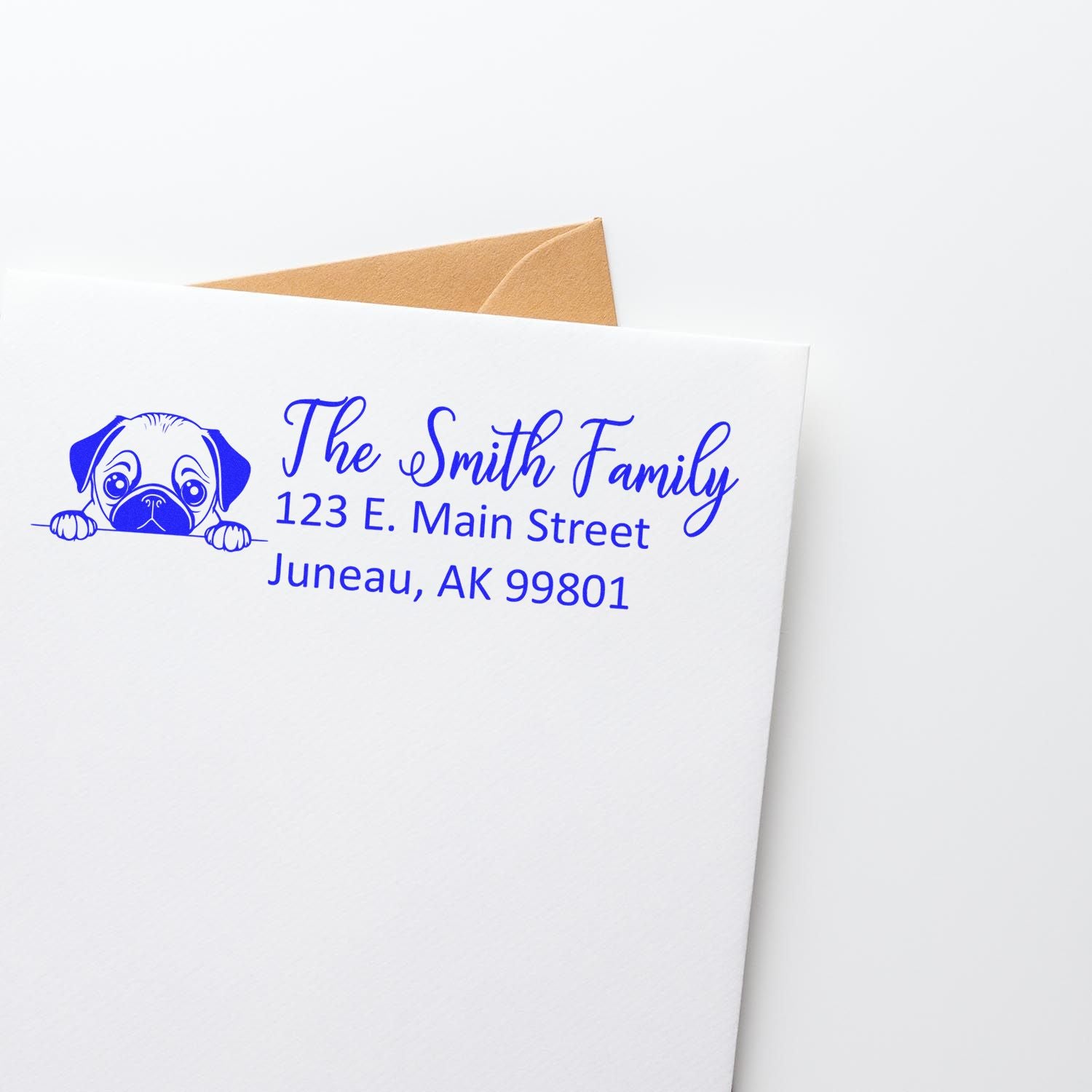 Custom dog address rubber stamp on envelope with The Smith Family and Juneau, AK return address