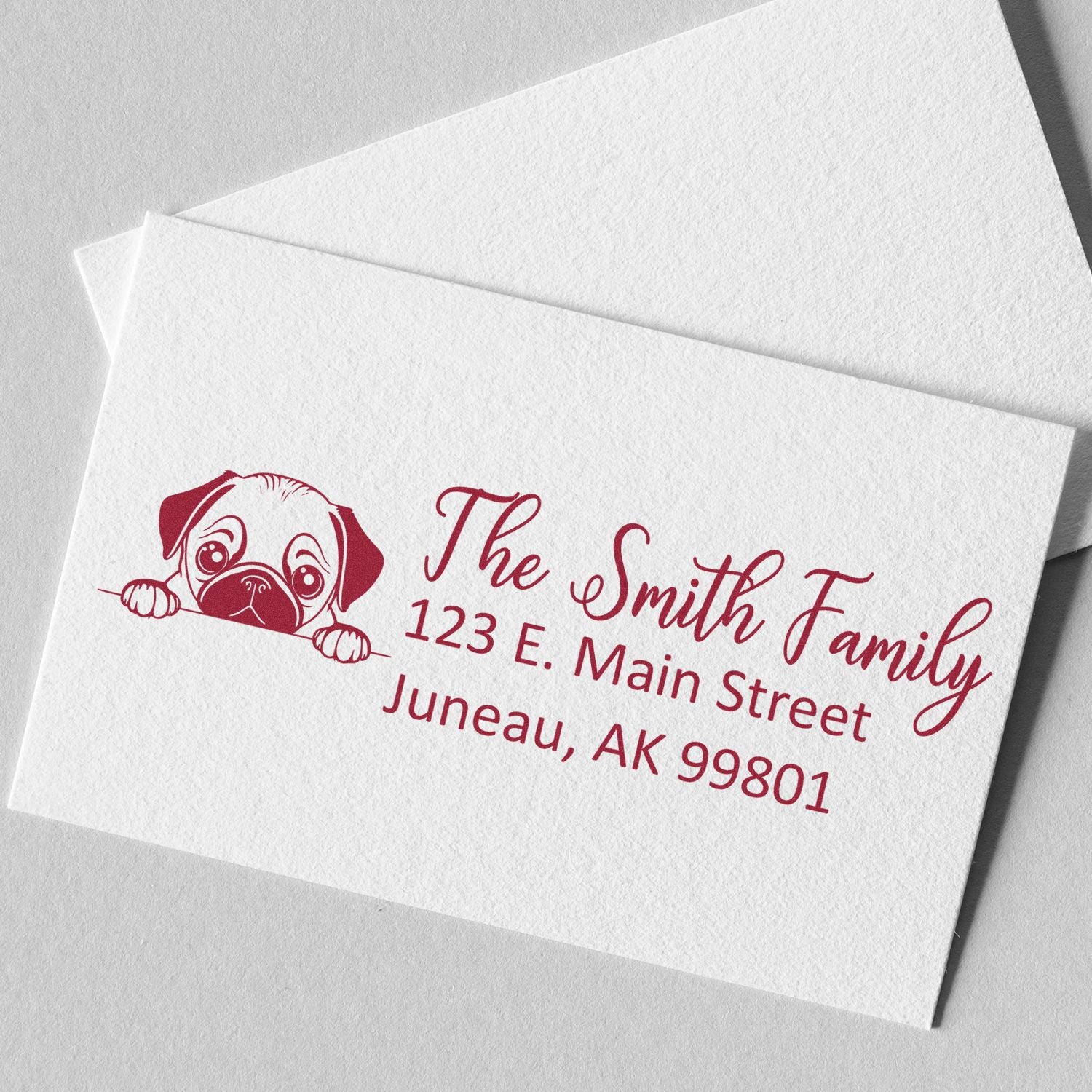 Custom family return address rubber stamp with pug dog design for envelopes, featuring The Smith Family address.