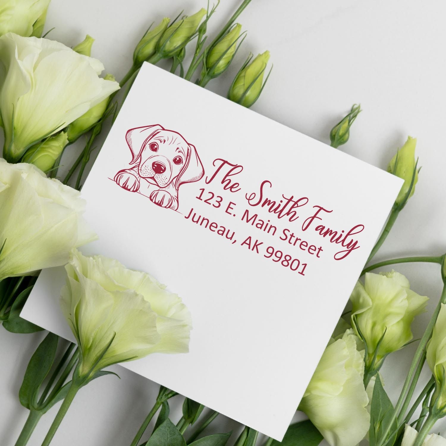 Personalized family return address rubber stamp with puppy design for envelopes and wedding invitations.