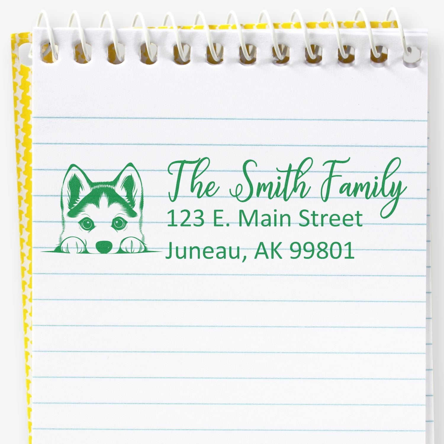 Personalized return address rubber stamp with husky dog and The Smith Family, 123 E. Main Street, Juneau, AK 99801.